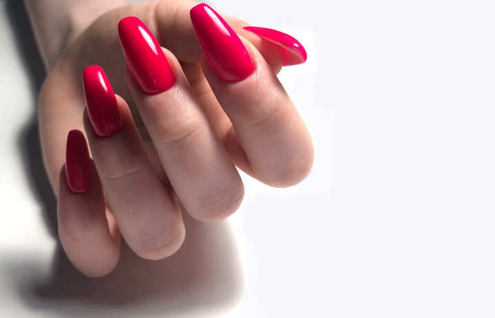 hand with red nails manicure